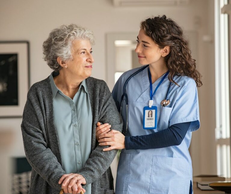 This image depicts a caregiver with a senior woman.