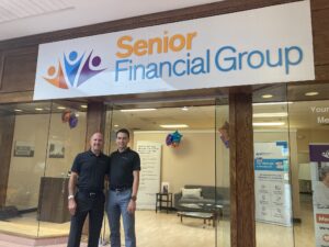 Founder Jerold Johnson stands with his son, Jackson Johnson, current president of Senior Financial Group.