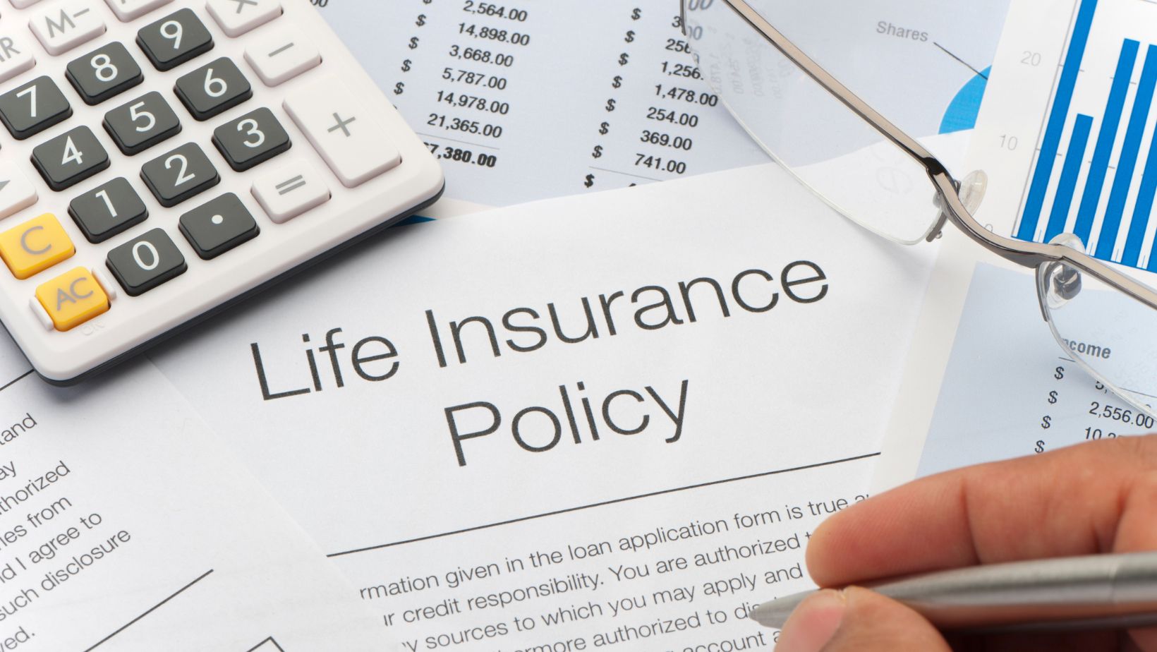 This picture is used to illustrate a blog post about life insurance for seniors. There is a document with the heading "Life Insurance Policy".